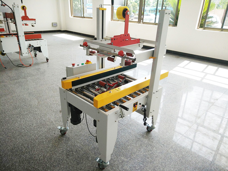 JS-FXZ500B 左右(yòu)驅動配聯線手(shou)動自動折蓋膠(jiao)帶封箱機