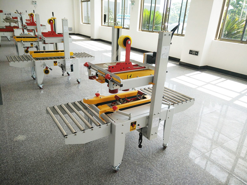 JS-FX500C 上下驅動手(shǒu)動折蓋膠帶(dai)封箱機